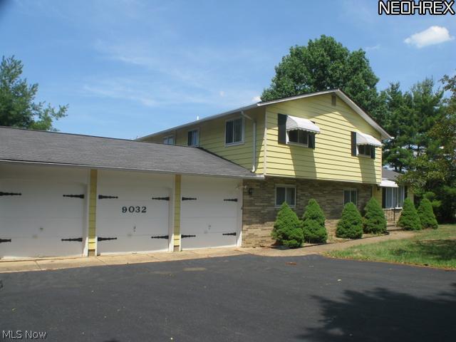 9032 Sherman Road Chesterland, OH 44026 - Photo 2 of 20 3 car garage with Paved drive