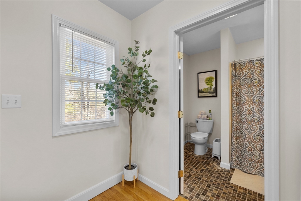 38 Brook Street Georgetown, MA 01833 - Photo 16 of 42 a bathroom with a toilet and a shower