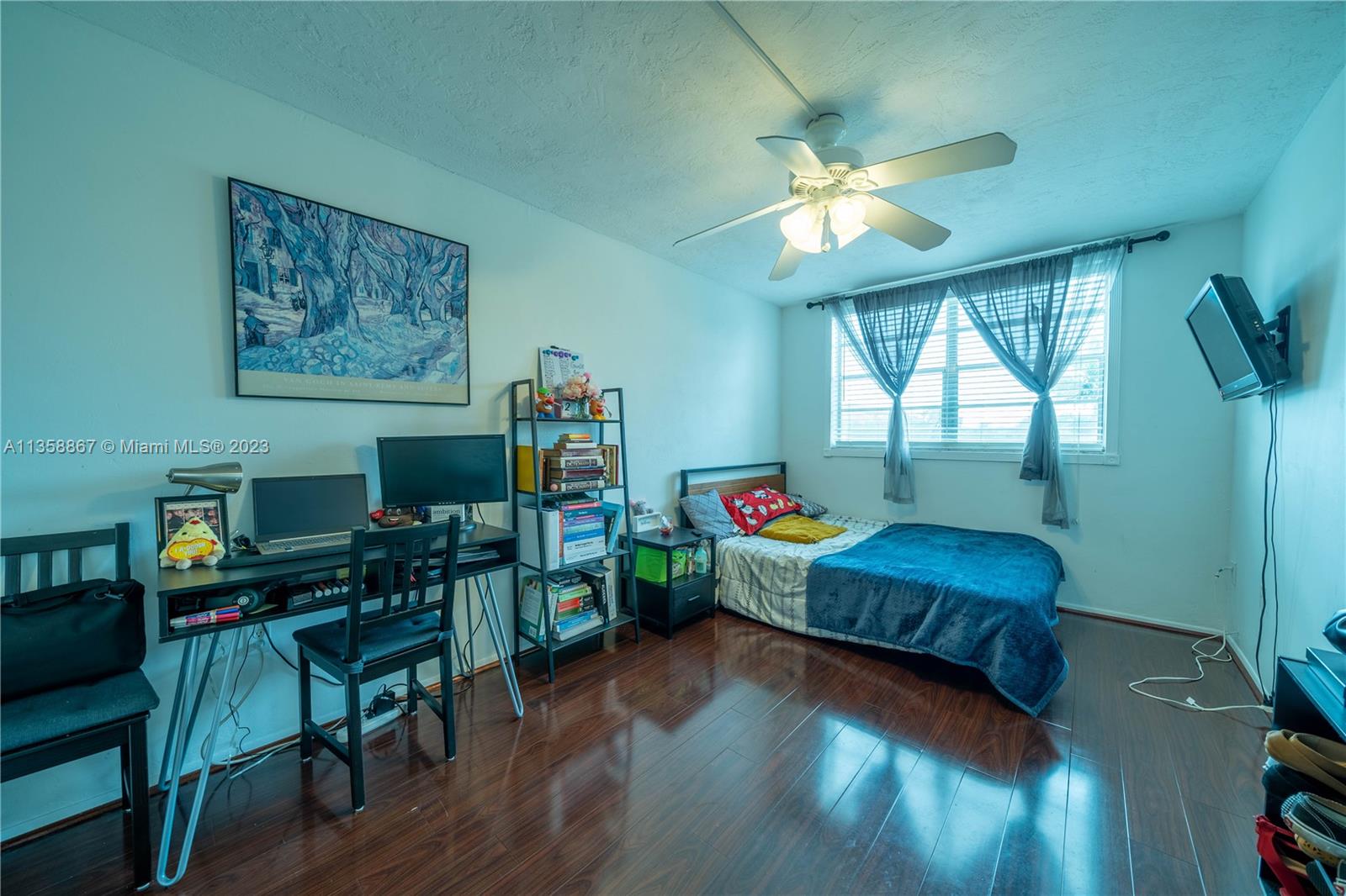 7300 Northwest 17th Street, Unit 314 Plantation, FL 33313 - Photo 14 of 30 a living room with furniture and a wooden floor