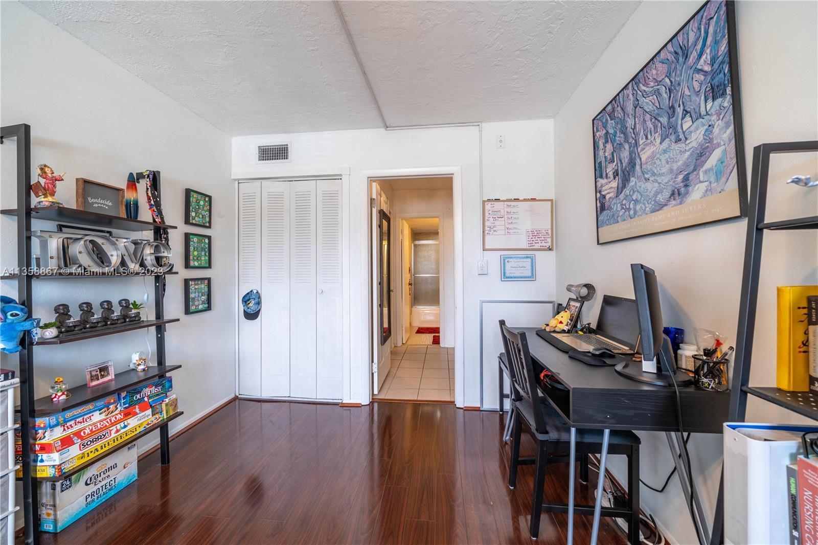 7300 Northwest 17th Street, Unit 314 Plantation, FL 33313 - Photo 15 of 30 a view of a workspace with furniture and toys