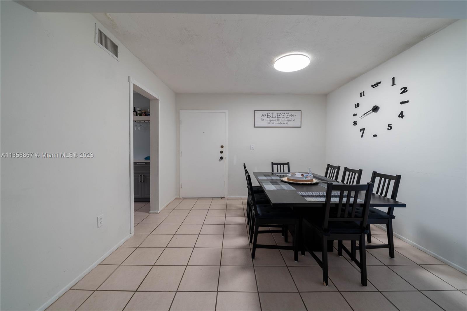 7300 Northwest 17th Street, Unit 314 Plantation, FL 33313 - Photo 2 of 30 a view of a dining room with furniture