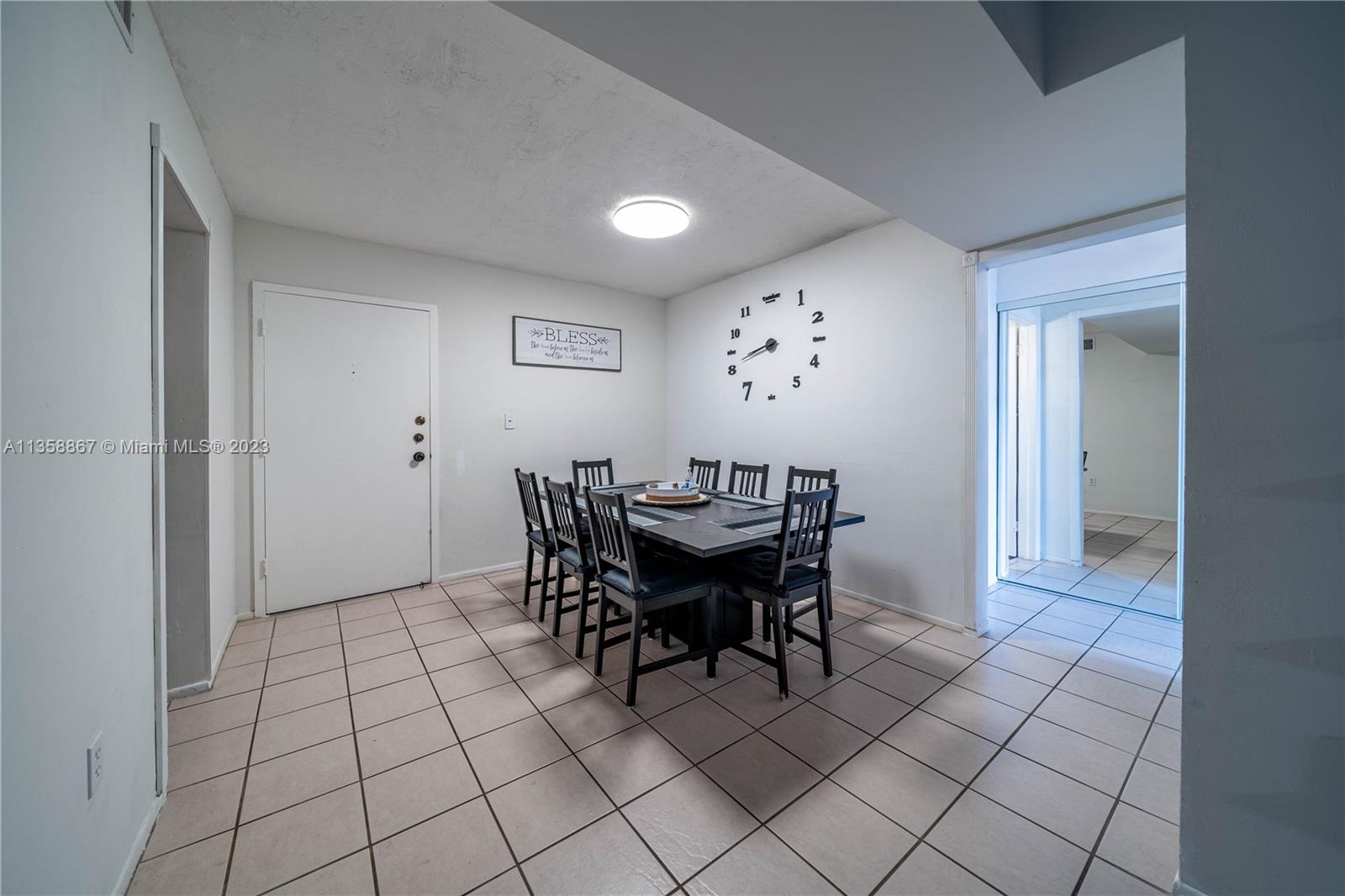 7300 Northwest 17th Street, Unit 314 Plantation, FL 33313 - Photo 4 of 30 a view of a dining room with furniture