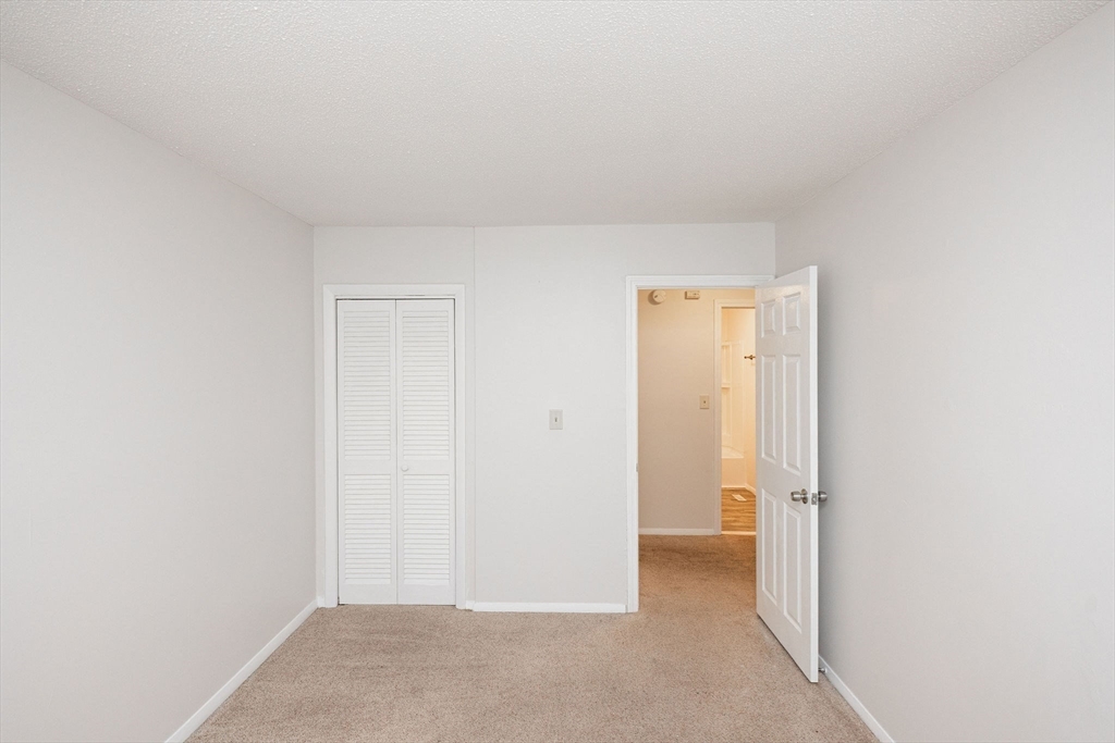 618 Edgebrook Drive, Unit 618 Boylston, MA 01505 - Photo 14 of 37 a view of an empty room
