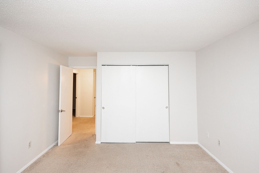 618 Edgebrook Drive, Unit 618 Boylston, MA 01505 - Photo 18 of 37 a view of an empty room