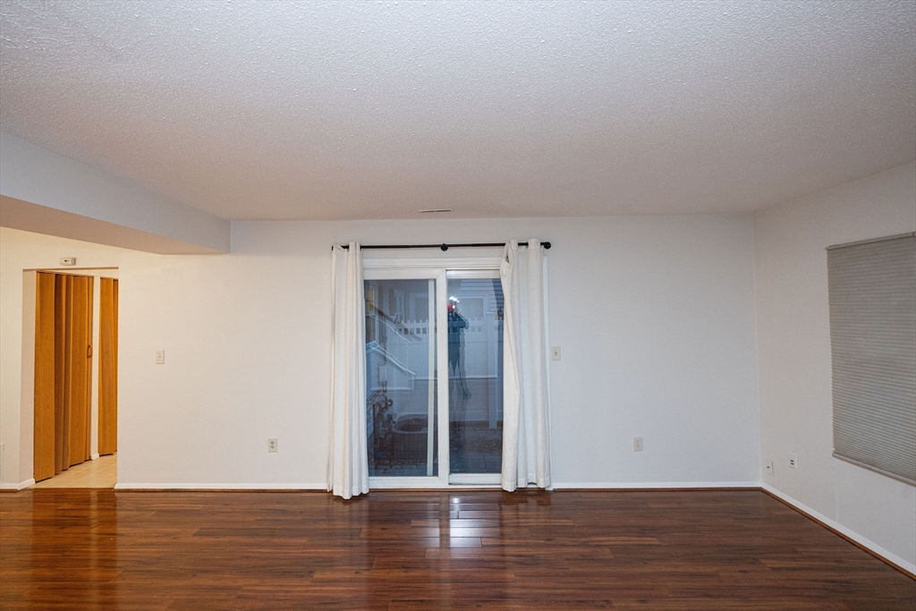 618 Edgebrook Drive, Unit 618 Boylston, MA 01505 - Photo 2 of 37 a view of a room with wooden floor
