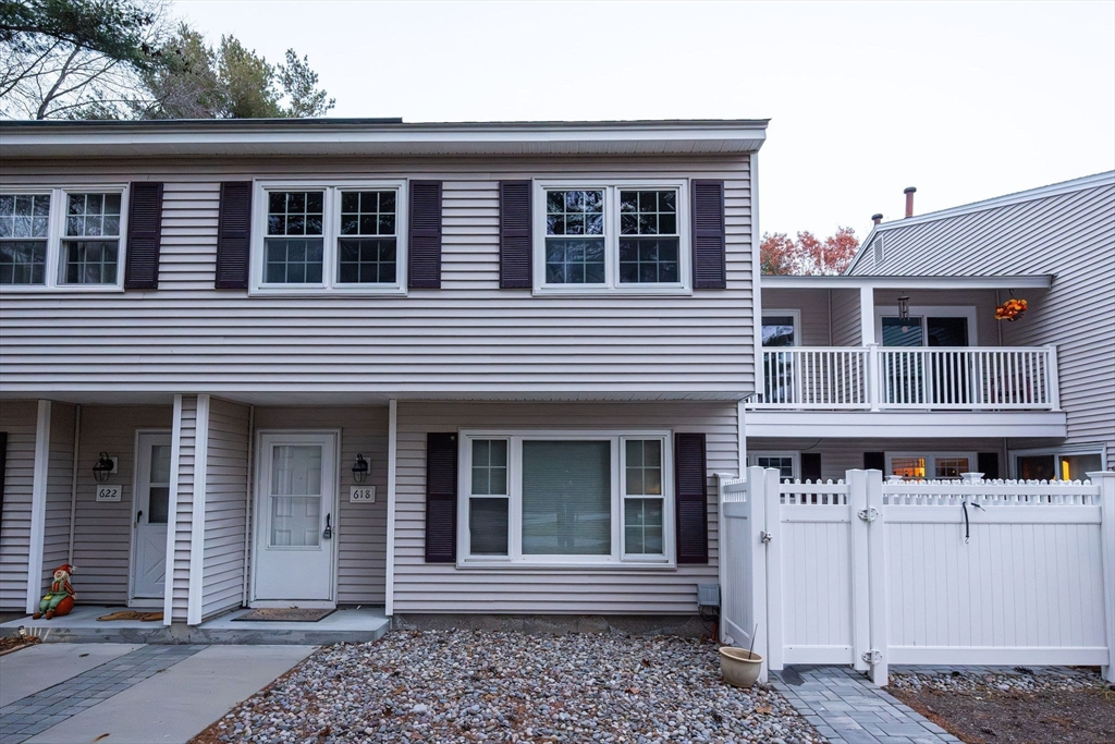 618 Edgebrook Drive, Unit 618 Boylston, MA 01505 - Photo 31 of 37 a front view of a house with a porch