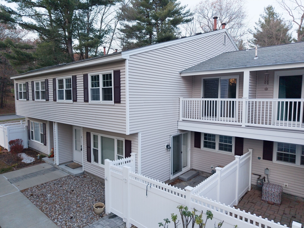 618 Edgebrook Drive, Unit 618 Boylston, MA 01505 - Photo 33 of 37 a front view of a house with balcony
