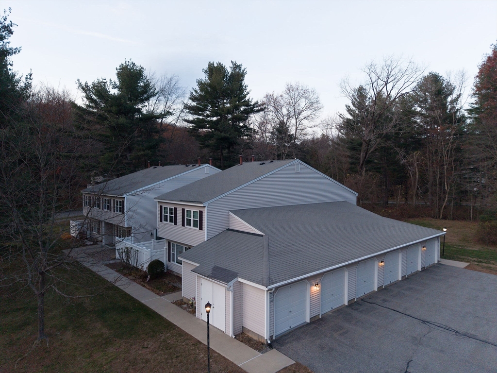 618 Edgebrook Drive, Unit 618 Boylston, MA 01505 - Photo 35 of 37 an aerial view of a house with a yard