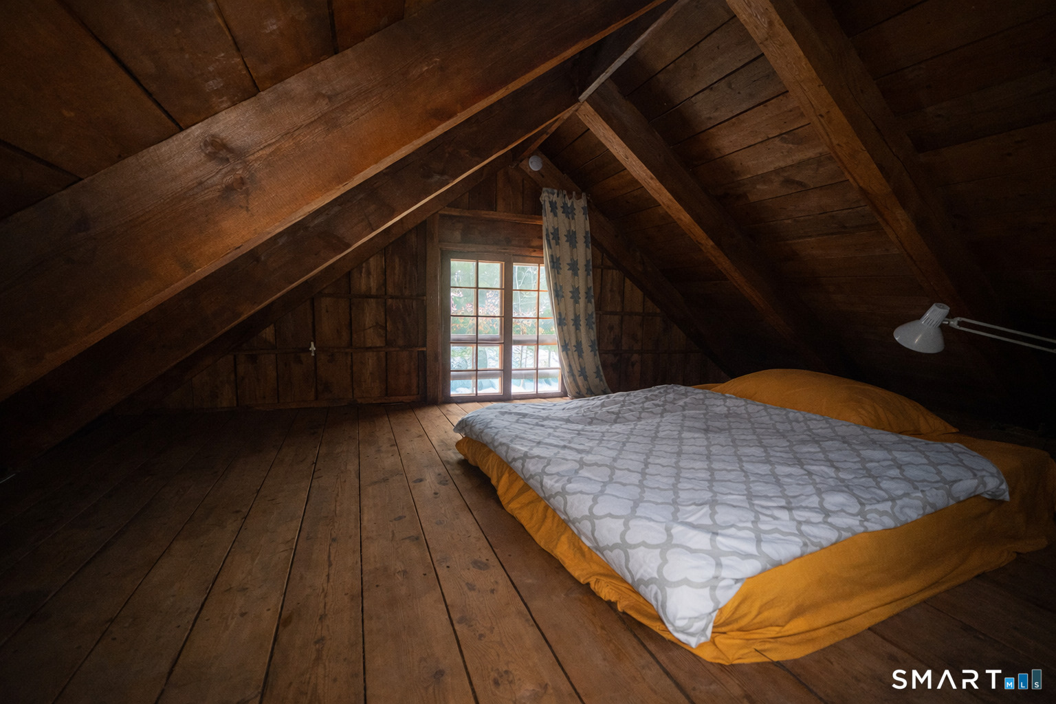 45 Hoppen Road, Unit MAIN New Hartford, CT 06057 - Photo 13 of 49 a bed sitting in a bedroom next to a window