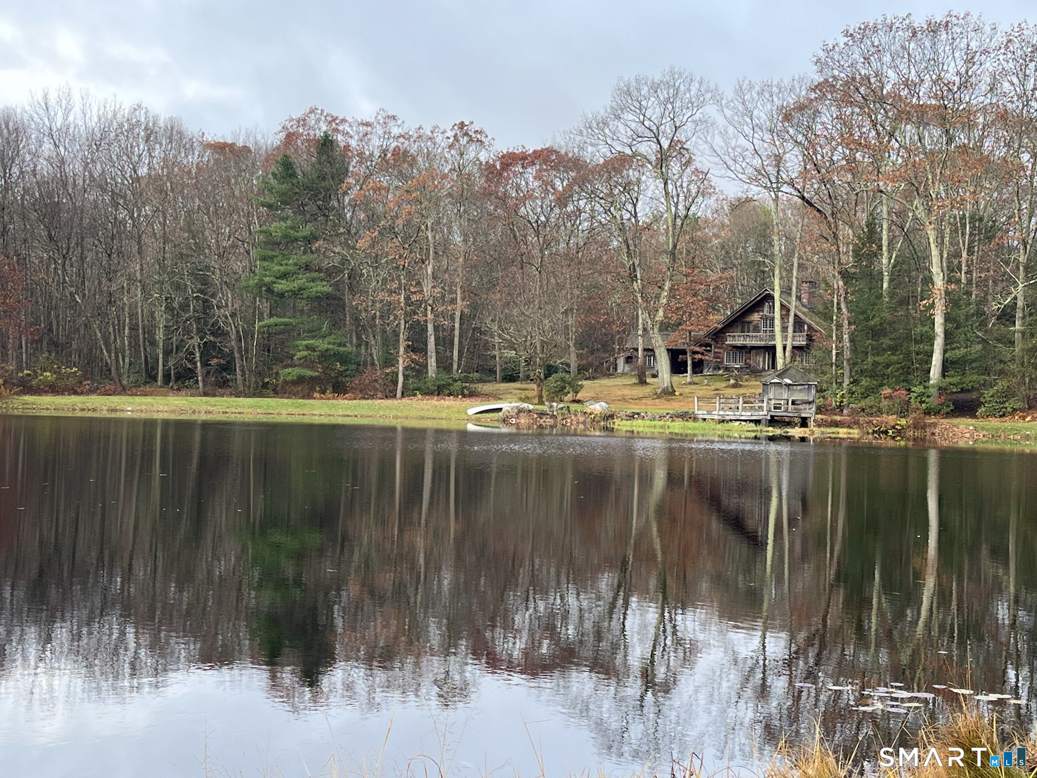 45 Hoppen Road, Unit MAIN New Hartford, CT 06057 - Photo 34 of 49 a view of lake with trees