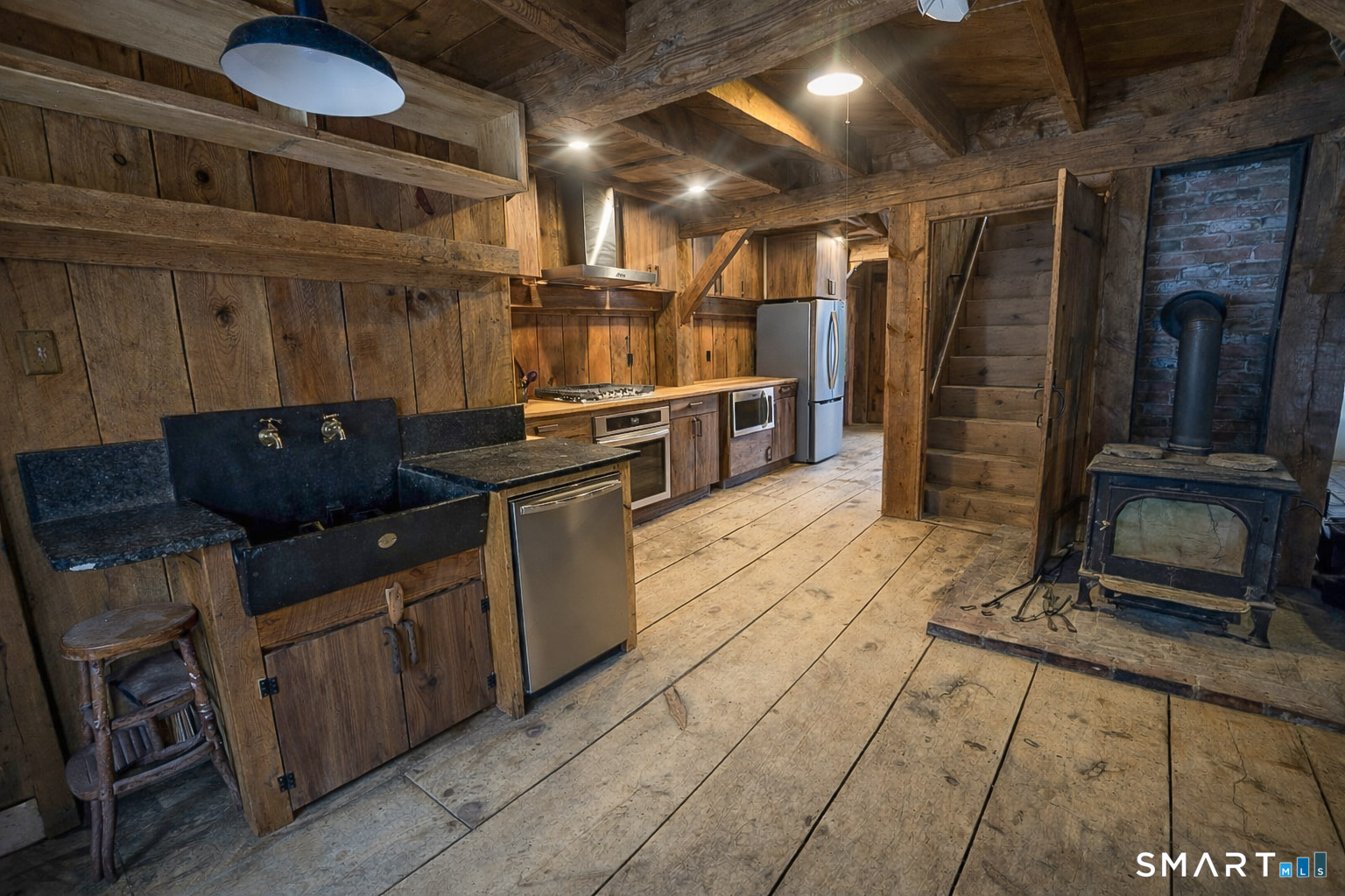 45 Hoppen Road, Unit MAIN New Hartford, CT 06057 - Photo 38 of 49 a kitchen with granite countertop lots of counter top space