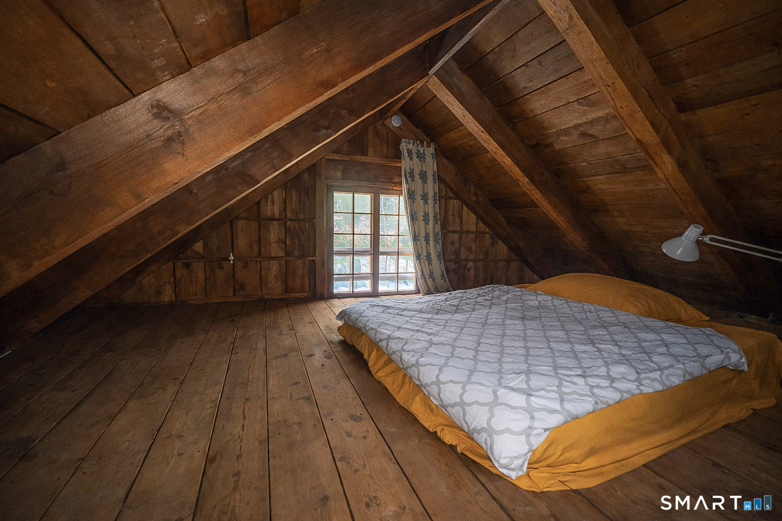 45 Hoppen Road, Unit MAIN New Hartford, CT 06057 - Photo 44 of 49 a view of balcony with wooden floor