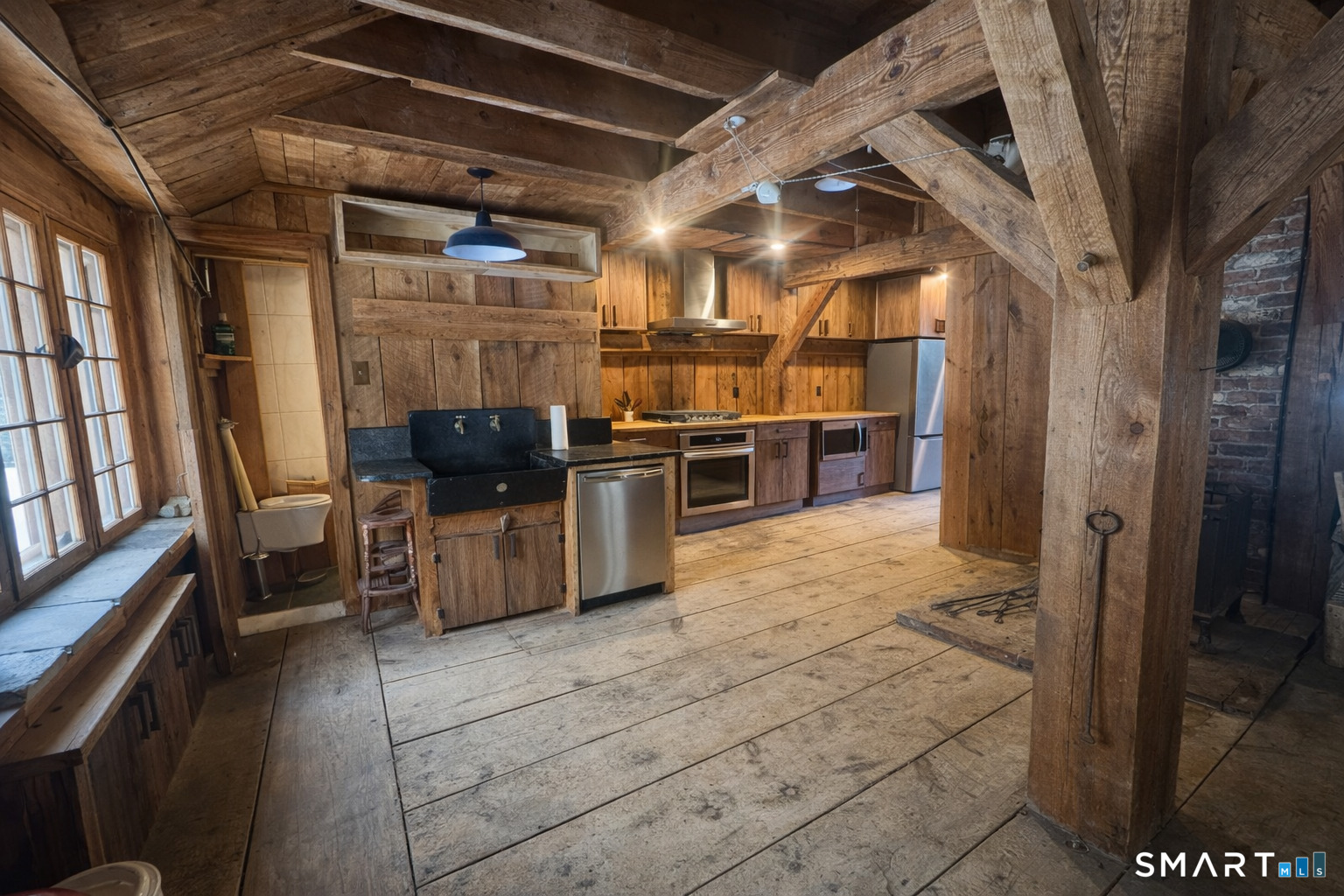 45 Hoppen Road, Unit MAIN New Hartford, CT 06057 - Photo 7 of 49 a open kitchen with stainless steel appliances granite countertop a stove a sink and a refrigerator