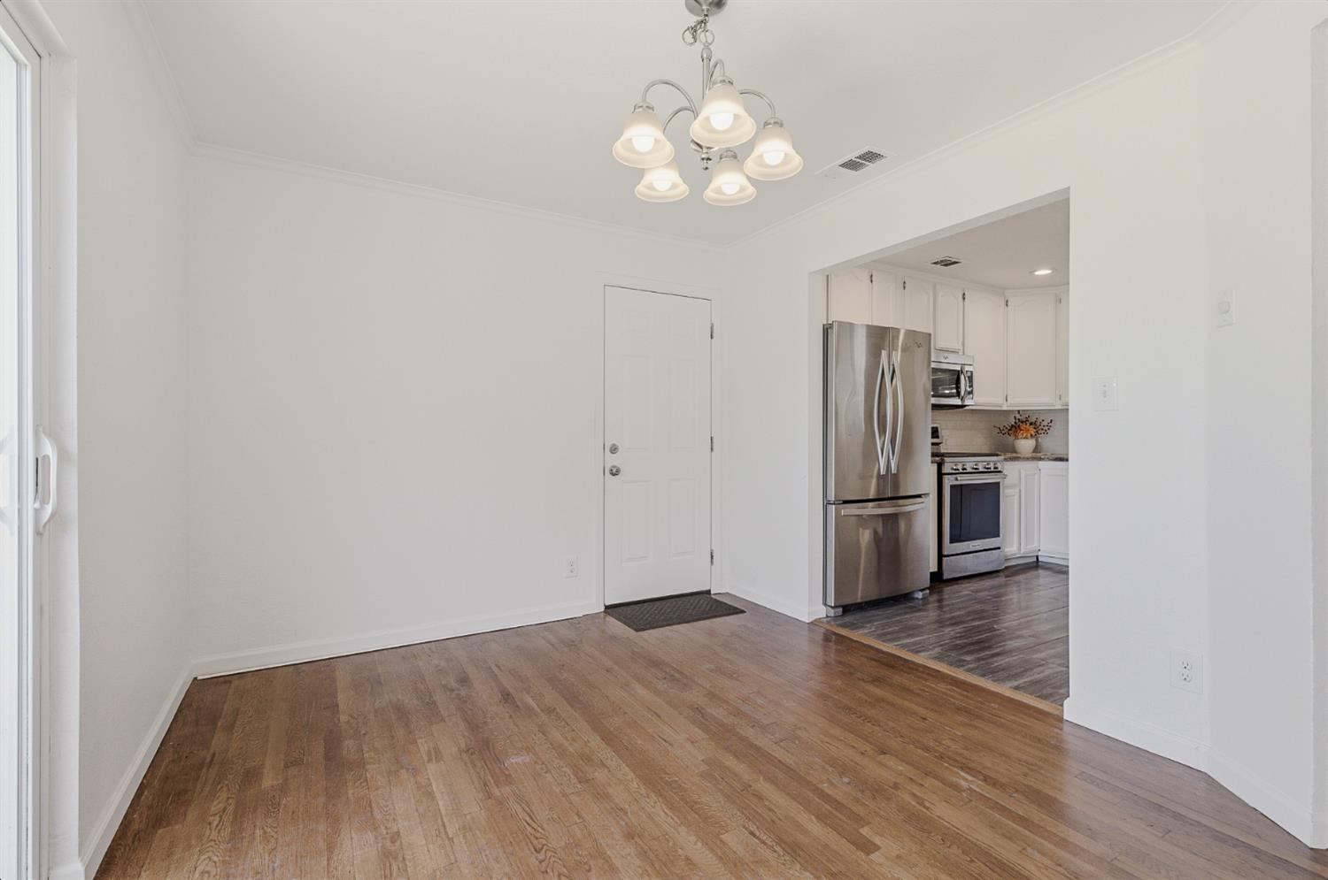 2511 Verna Way Sacramento, CA 95821 - Photo 15 of 34 a view of kitchen with refrigerator microwave and stove