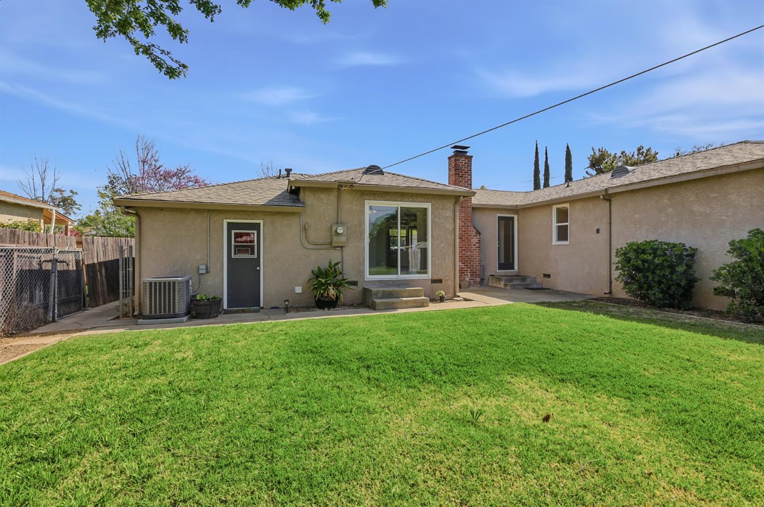 2511 Verna Way Sacramento, CA 95821 - Photo 27 of 34 a front view of a house with a garden