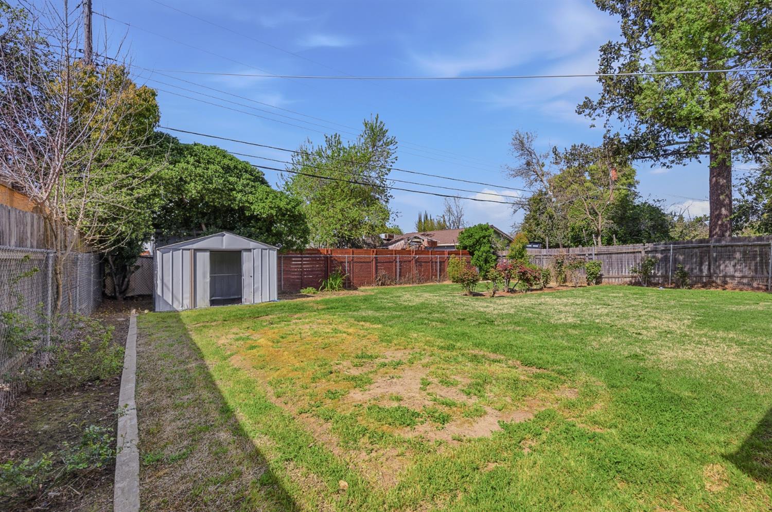 2511 Verna Way Sacramento, CA 95821 - Photo 29 of 34 a backyard of a house with lots of green space