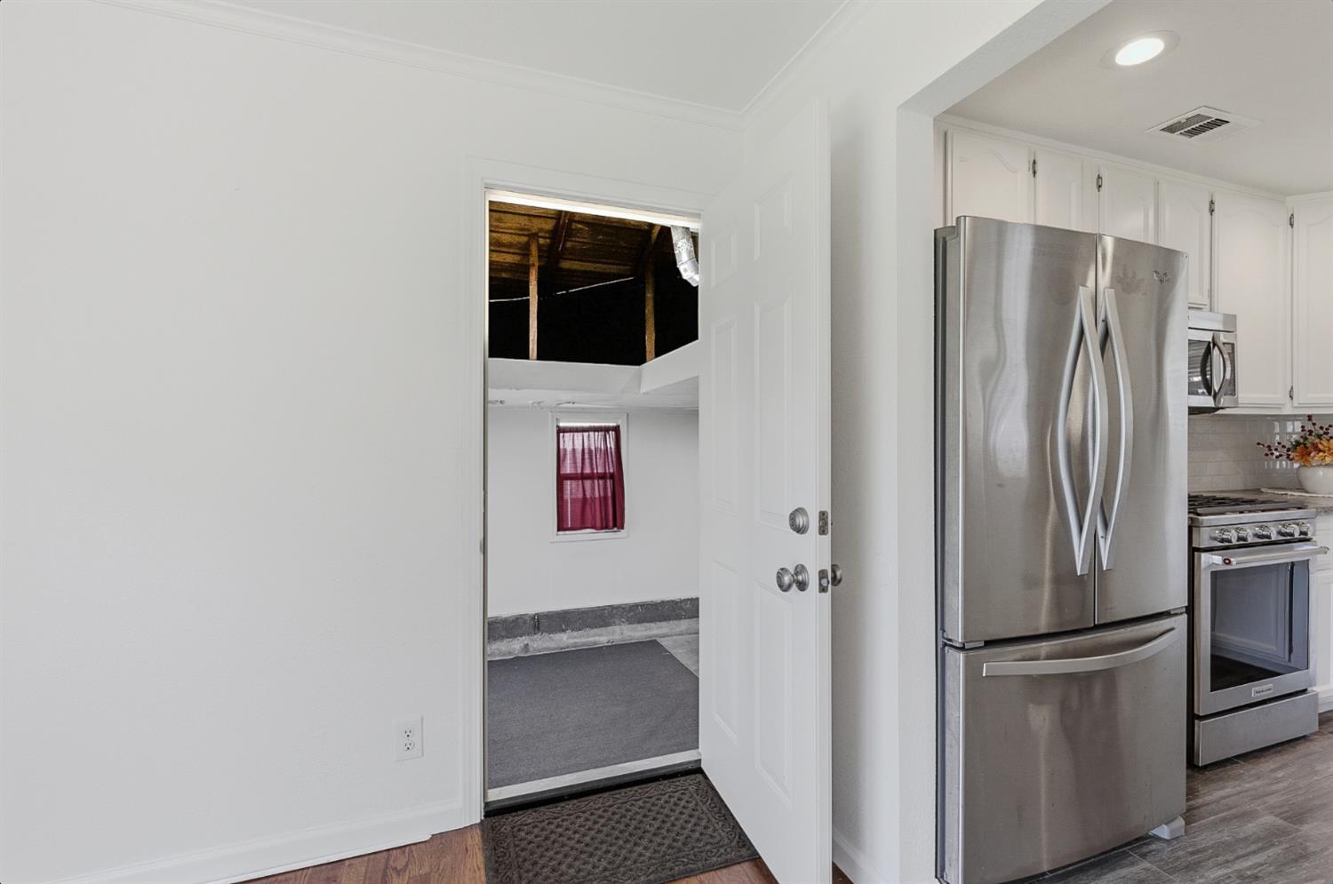 2511 Verna Way Sacramento, CA 95821 - Photo 31 of 34 a metallic refrigerator freezer sitting in a kitchen