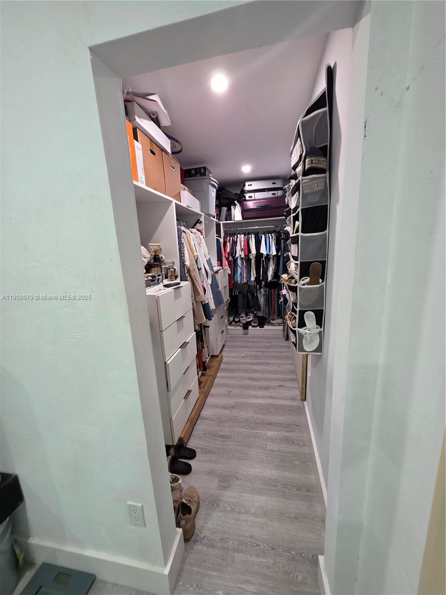 18200 Southwest 262nd Street Homestead, FL 33031 - Photo 17 of 30 a view of a hallway with wooden floor