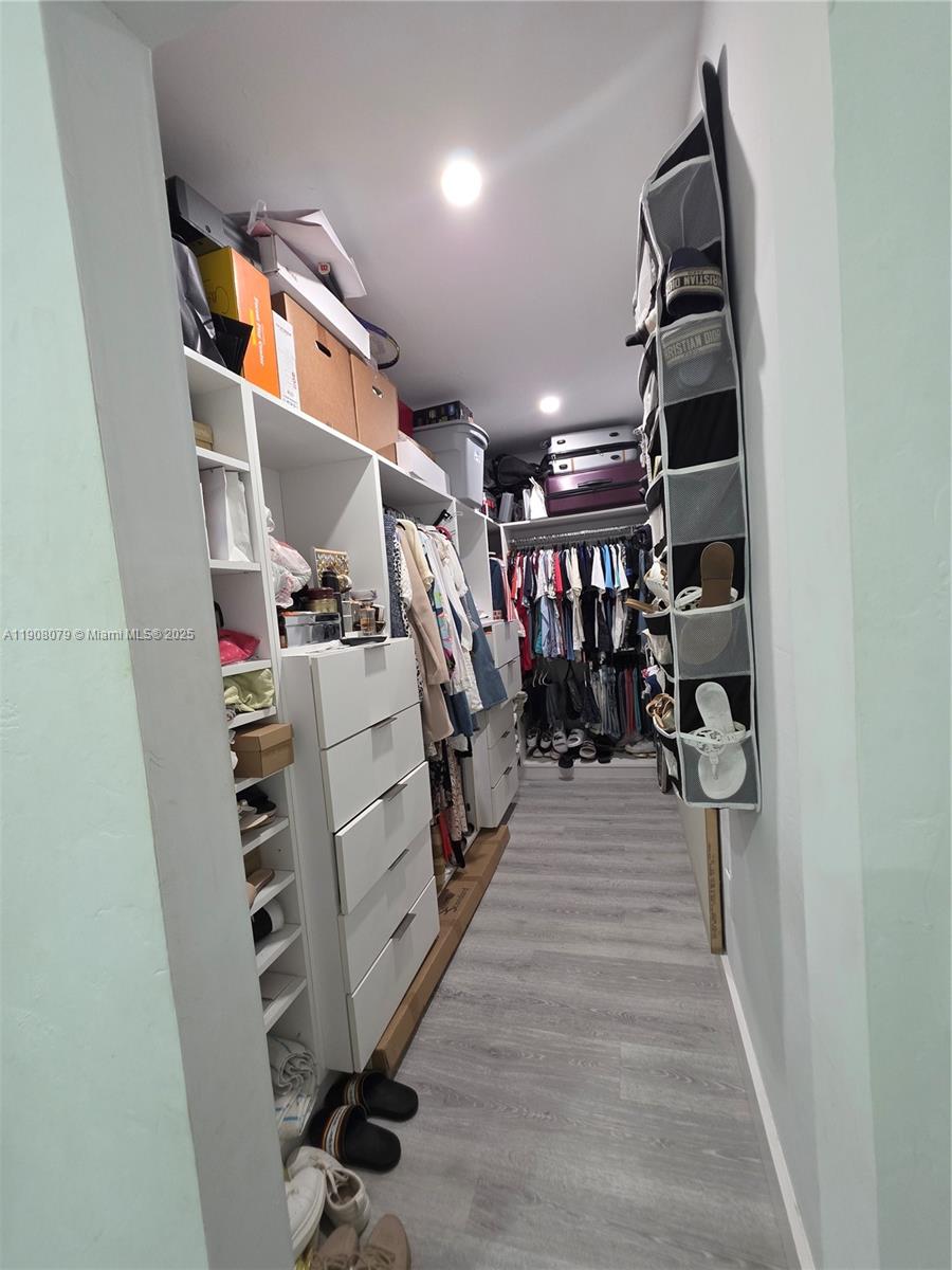 18200 Southwest 262nd Street Homestead, FL 33031 - Photo 18 of 30 a view of a closet and storage