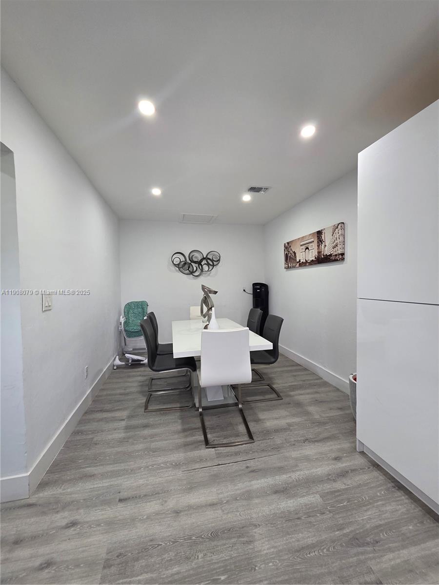 18200 Southwest 262nd Street Homestead, FL 33031 - Photo 8 of 30 a living room with furniture and a table