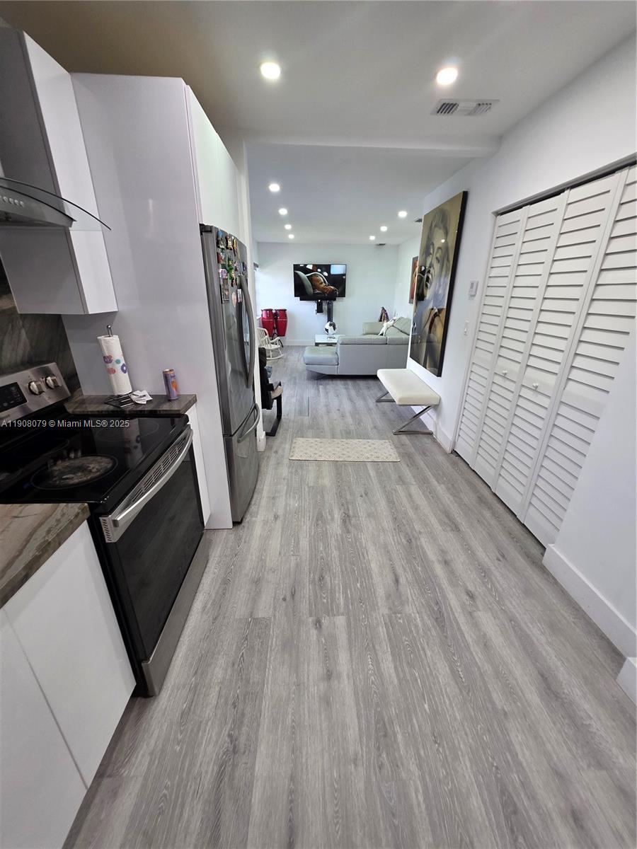 18200 Southwest 262nd Street Homestead, FL 33031 - Photo 10 of 30 a view of a kitchen with storage and utility