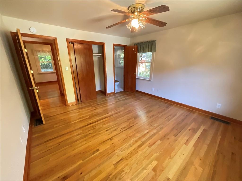 2492 Hunting Valley Drive Decatur, GA 30033 - Photo 16 of 30 wooden floor in an empty room with a window