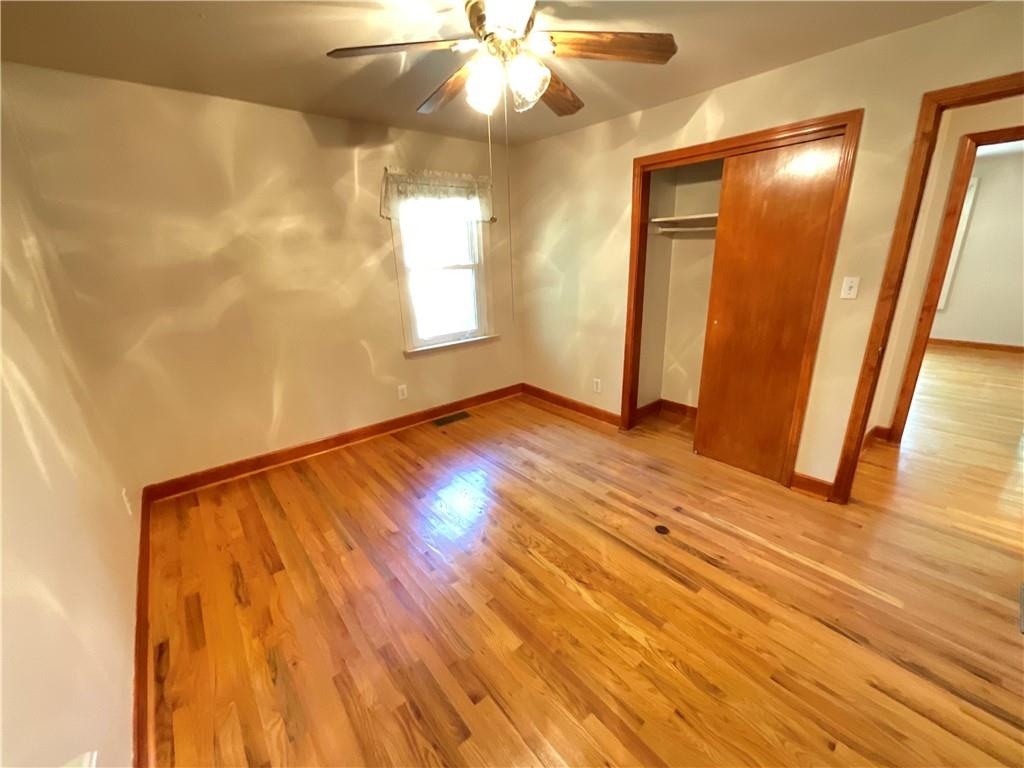 2492 Hunting Valley Drive Decatur, GA 30033 - Photo 19 of 30 a view of an empty room with wooden floor and a window