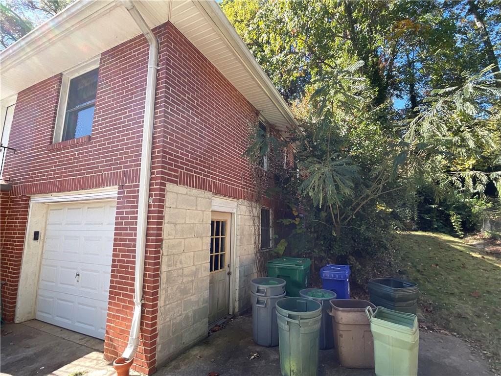 2492 Hunting Valley Drive Decatur, GA 30033 - Photo 3 of 30 a backyard of a house with fountain table and chairs