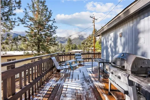 a view of balcony with furniture