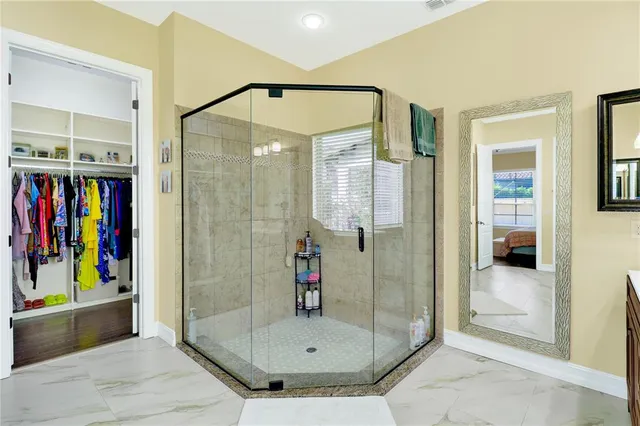 a view of a dining room with furniture and toys