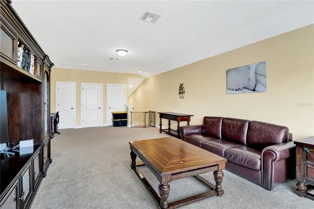 a bathroom with a granite countertop tub sink toilet and shower