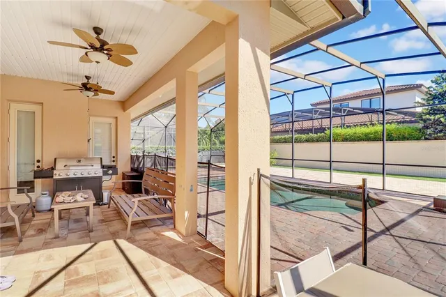 a view of swimming pool with seating area