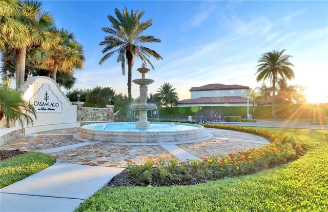a view of a yard with palm trees