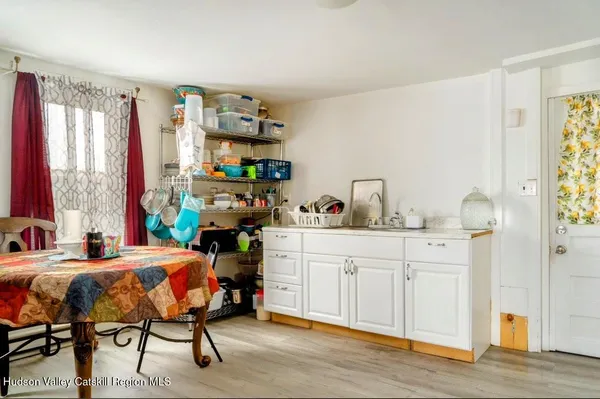 a bedroom with a bed and a table in it