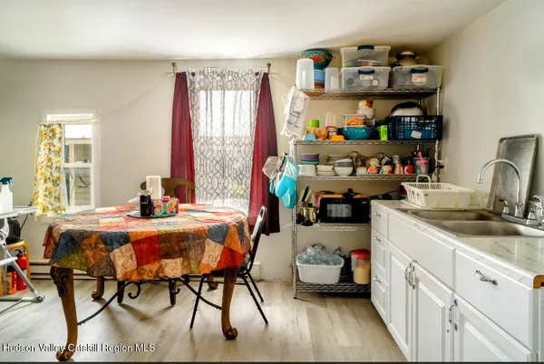a bedroom with furniture a bed and a window