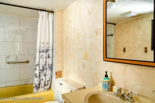 a bathroom with a sink and a shower