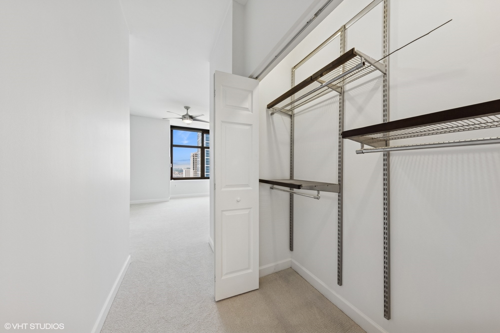 233 East 13th Street, Unit 2210 Chicago, IL 60605 - Photo 18 of 28 a view of a hallway with closet