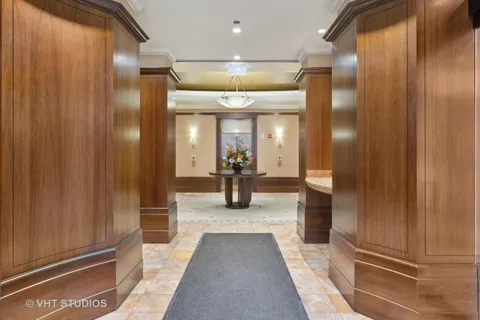 a view of a hallway with a furniture