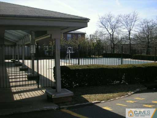 50 Fox Road, Unit 8A Edison, NJ 08817 - Photo 7 of 8 a view of a porch with a bench