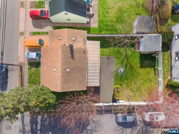 an aerial view of a house with outdoor space