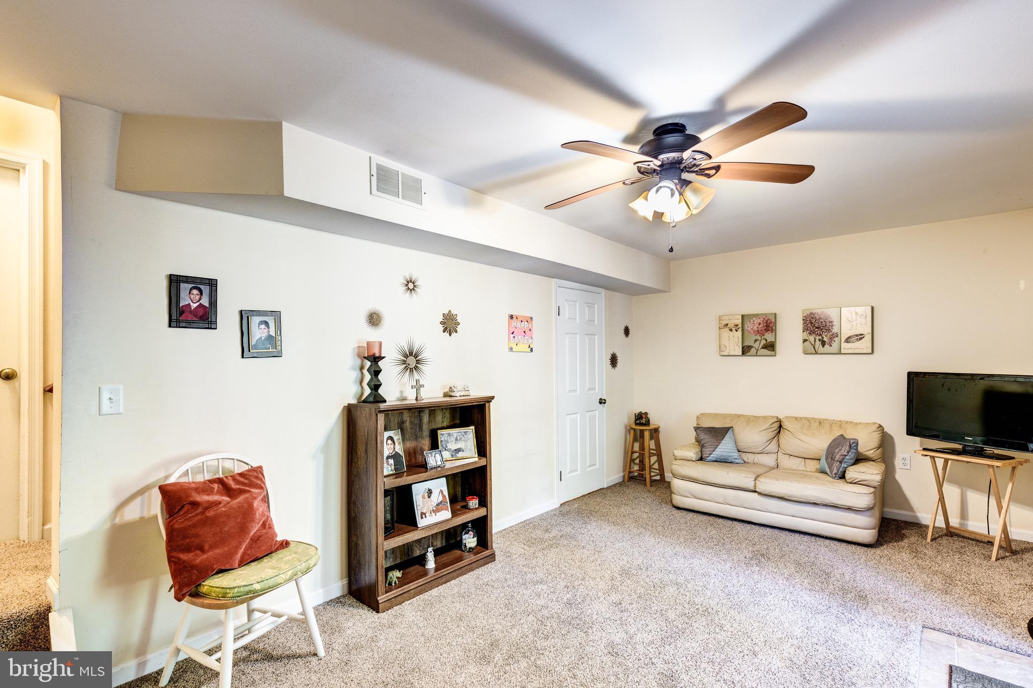 424 Logan Drive Westminster, MD 21157 - Photo 21 of 31 Lower level living space with half bath