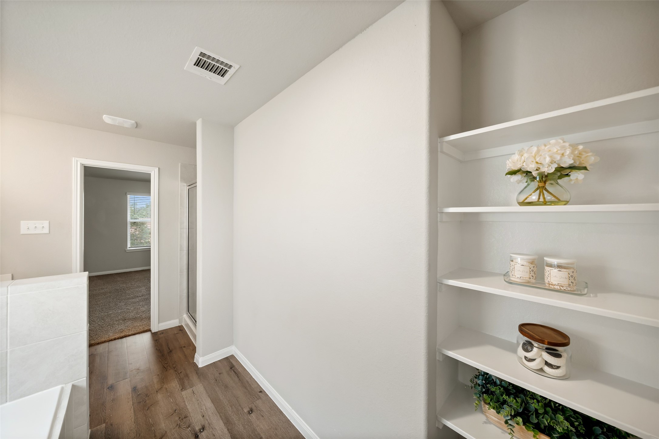 3628 Cub Drive Conroe, TX 77301 - Photo 23 of 32 Bonus! Additional storage shelves in your primary bath.