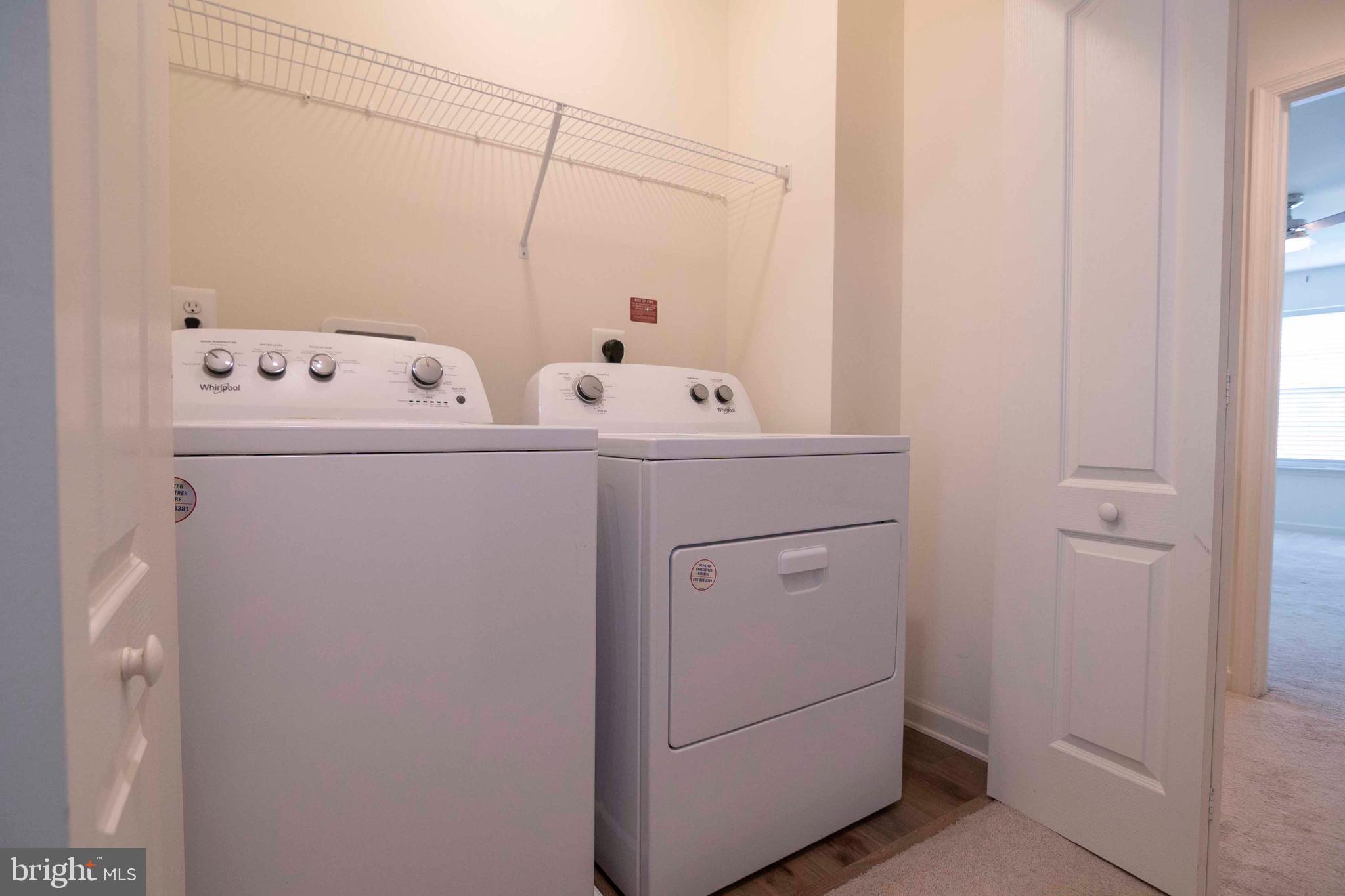 15 Pitch Pine Bunker Hill, WV 25413 - Photo 36 of 37 a utility room with dryer and washer