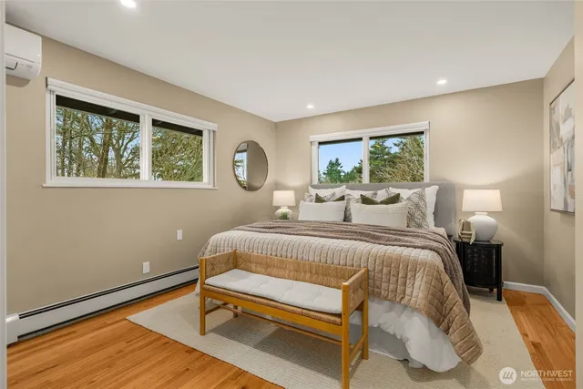 a bed room with a bed and a window