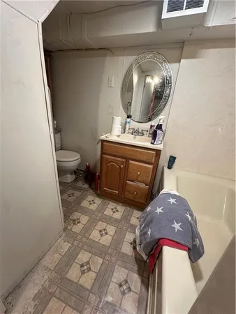 a living room with a toilet