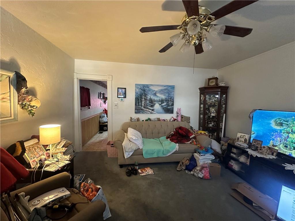 83 Frazier Avenue McKees Rocks, PA 15136 - Photo 10 of 27 a living room with furniture and a flat screen tv
