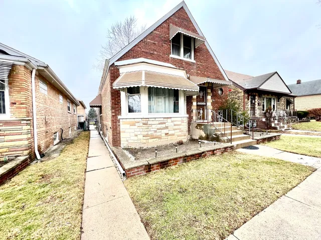 a front view of a house with swimming pool