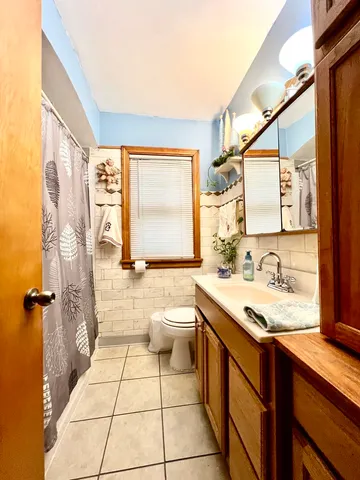 a room with furniture and bicycles