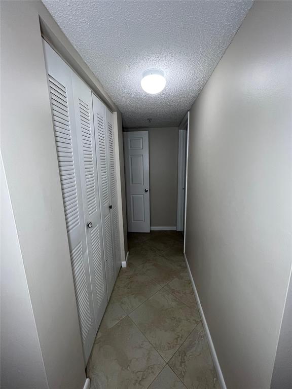 2600 South University Drive, Unit 309 Davie, FL 33328 - Photo 20 of 23 a view of hallway