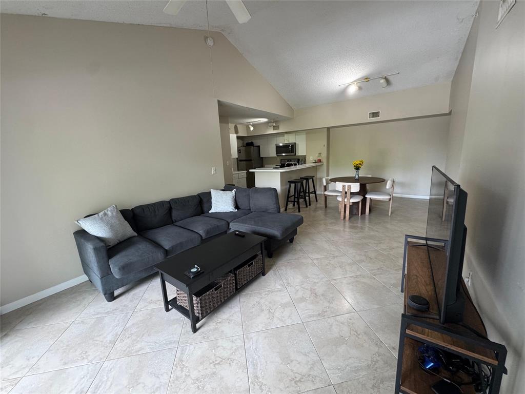 2600 South University Drive, Unit 309 Davie, FL 33328 - Photo 2 of 23 a living room with furniture